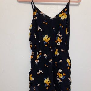 Cute Romper from H & M. Wore once for graduation pics!